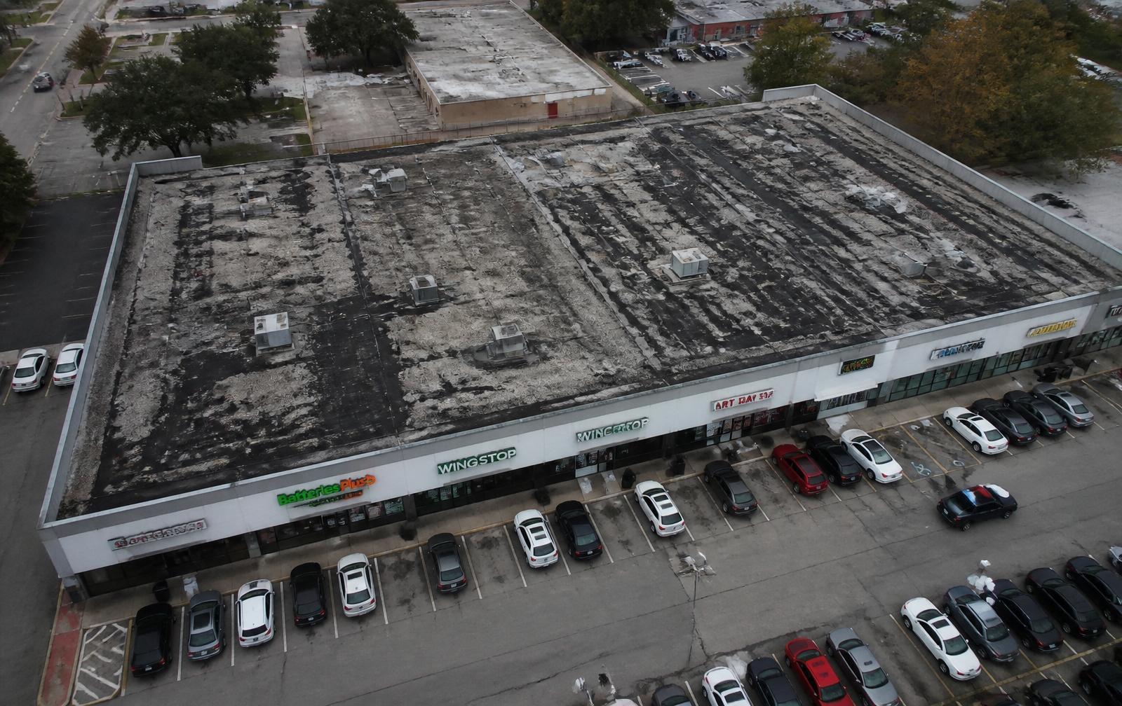 EPDM Retail Center Retrofit — before