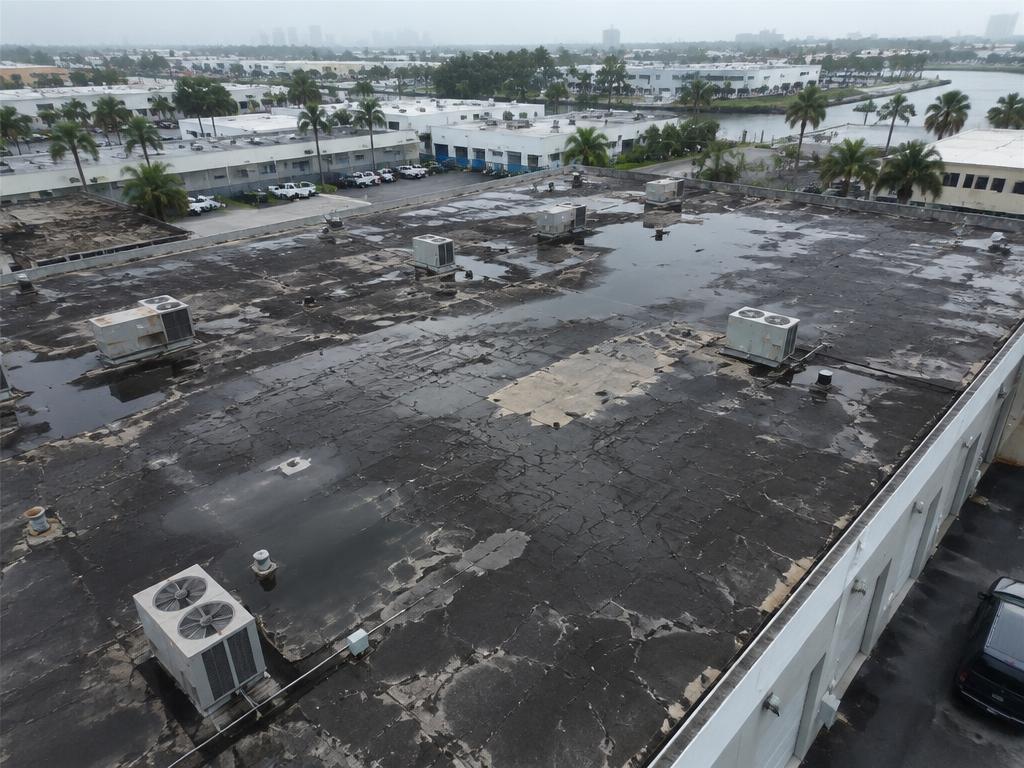 TPO Warehouse Re-Roof in Miami, FL before the roofing work